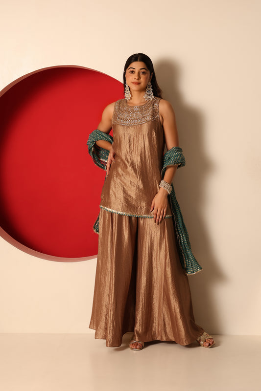 Riva- Gold Tissue short Kurta and Flaired pants paired with crush chanderi dupatta