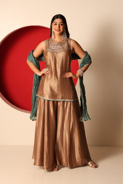 Riva- Gold Tissue short Kurta and Flaired pants paired with crush chanderi dupatta