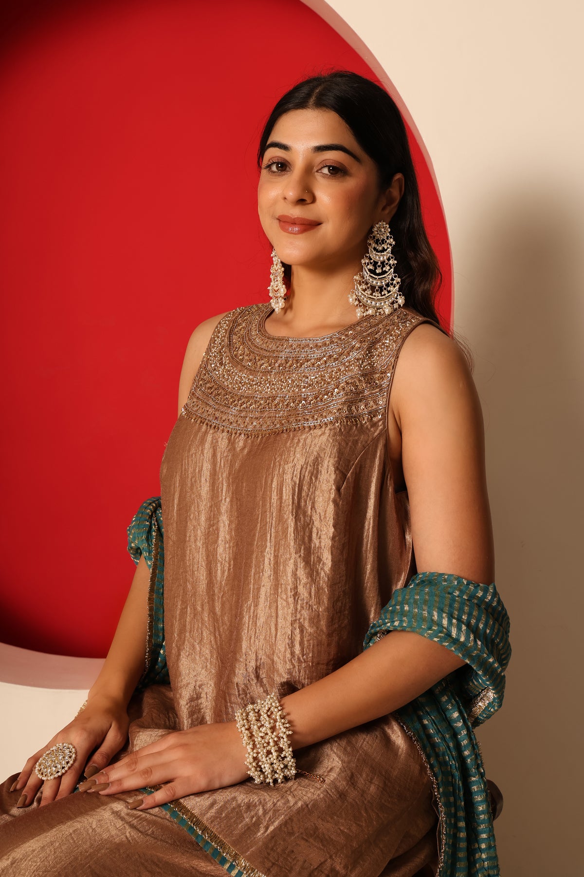 Riva- Gold Tissue short Kurta and Flaired pants paired with crush chanderi dupatta