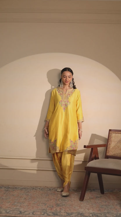 Yellow kurta paired with Dhoti Set